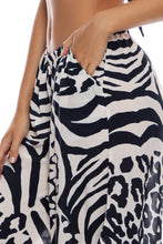 ALL THE SKINS - Front Twist Bustier Halter Top & Open Sides Wide Leg Pant • Multicolor